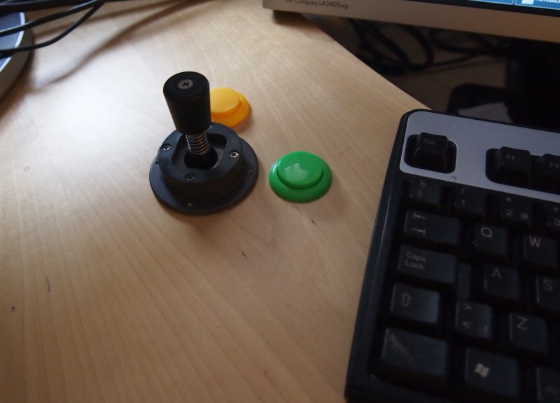 Joystick mouse installed in desk
